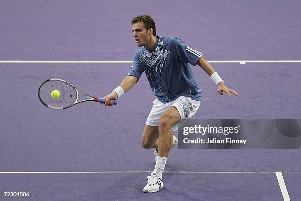 Paul-Henri Mathieu of France plays a volley in his match against Andreas Seppi of Italy during day one of the BNP Paribas ATP Tennis Masters Series...