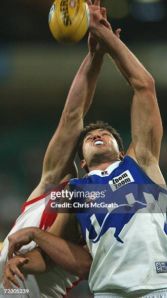 Mark Porter of the Kangaroos strives for the ball during the round 4 AFL match between the Sydney Swans and the Kangaroos held at the Sydney Cricket...