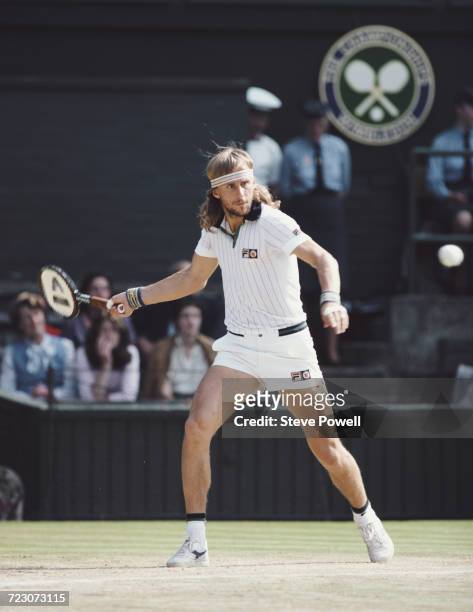 Bjorn Borg of Sweden makes a forehand return against John McEnroe during their Men's Singles Final match at the Wimbledon Lawn Tennis Championship on...