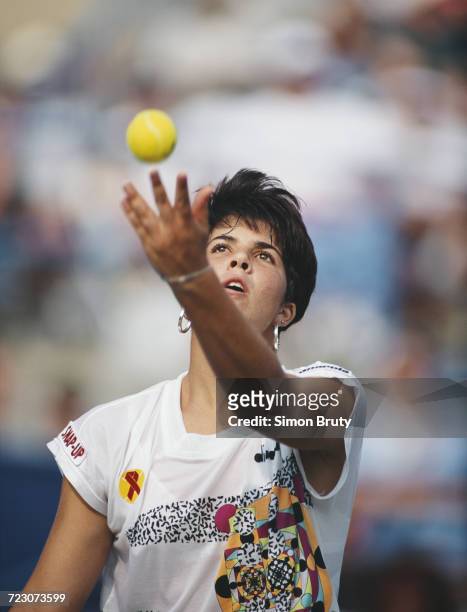 Jennifer Capriati of the United States serves to Leila Meskhi during their first round match of the Women's Singles at the US Open Tennis...