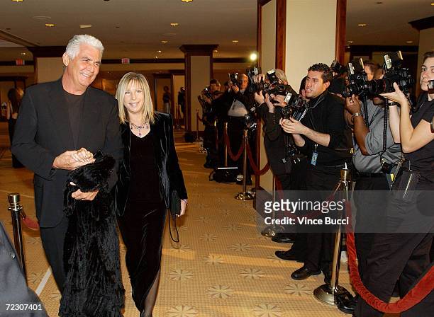Singer Barbra Streisand and husband actor James Brolin attend the 54th Annual Directors Guild Awards at the Century Park Plaza Hotel March 9, 2002...