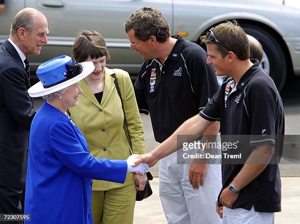 New Zealand Prime Minister Helen Clarke introduces Britains Queen Elizabeth II to Team New Zealand skipper Dean Barker as the Queens husband, The...