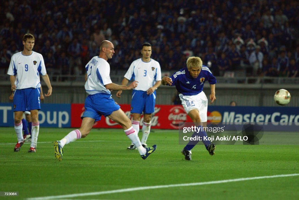 Junichi Inamoto of Japan scores