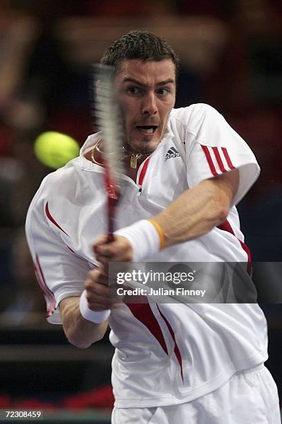 Marat Safin of Russia plays a backhand in his match against Nicolas Mahut of France during day one of the BNP Paribas ATP Tennis Masters Series at...