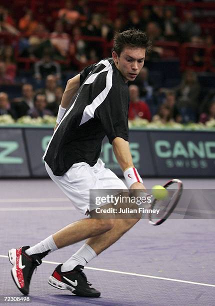 Nicolas Mahut of France plays a volley in his match against Marat Safin of Russia during day one of the BNP Paribas ATP Tennis Masters Series at the...