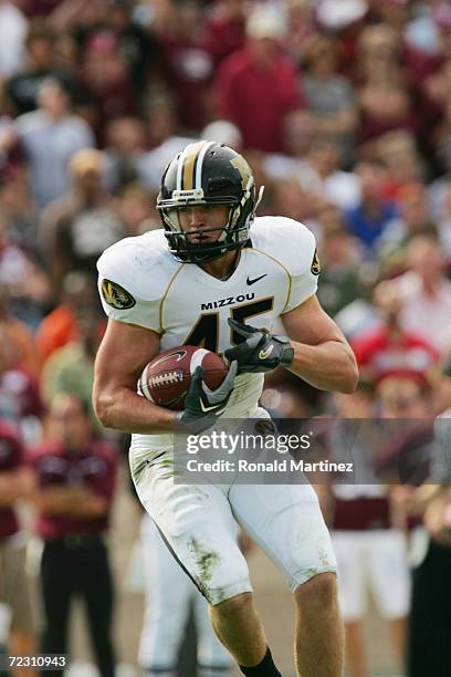 Tight end Chase Coffman of the Missouri Tigers carries the ball against the Texas A&M Aggies at Kyle Field on October 14, 2006 in College Station,...