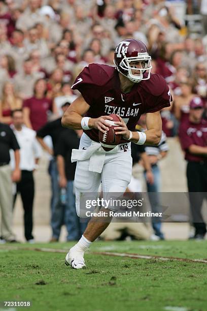 Quarterback Stephen McGee of the Texas A&M Aggies runs with the ball against the Missouri Tigers at Kyle Field on October 14, 2006 in College...