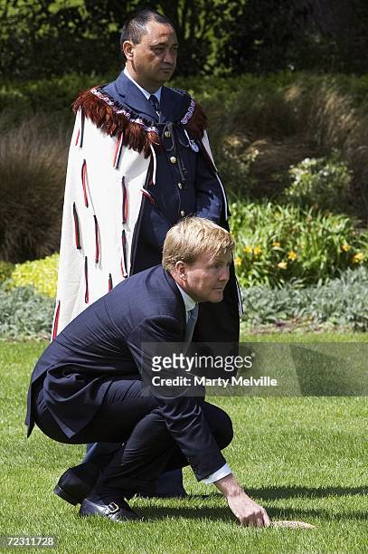 His Royal Highness The Prince of Orange of The Netherlands is guided by Warrent Officer Dug Wallice at Government House on the ninth day of their 13...