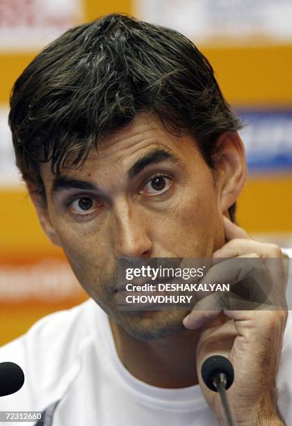 New Zealand cricket captain Stephen Fleming gestures as he answers a question at a press conference at The Punjab Cricket Association Stadium in...