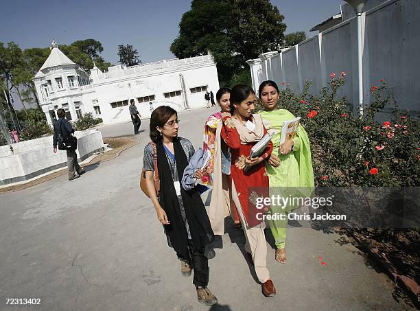 Pupils walk through Fatima Jinnah college on the third day of the Royal Tour of Pakistan on October 31, 2006 in Islamabad, Pakistan. Prince Charles...