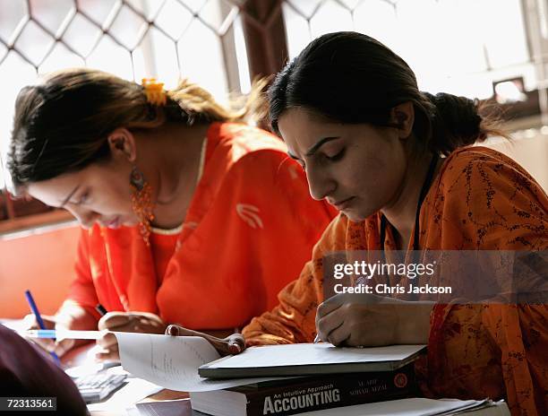 Pupils study in a public administration lesson at Fatima Jinnah Womens University on the third day of the Royal Tour of Pakistan on October 31, 2006...