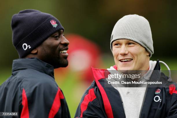 Paul Sackey and Josh Lewsey share a joke during the England rugby union training session at Bisham Abbey on October 31, 2006 in Marlow, United...