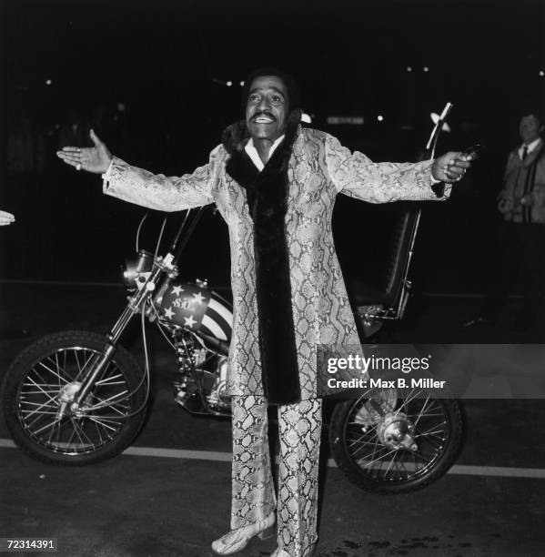 American dancer, singer and actor Sammy Davis Jr wears a snakeskin suit to the opening of the Cocoanut Grove in Florida, 1970.