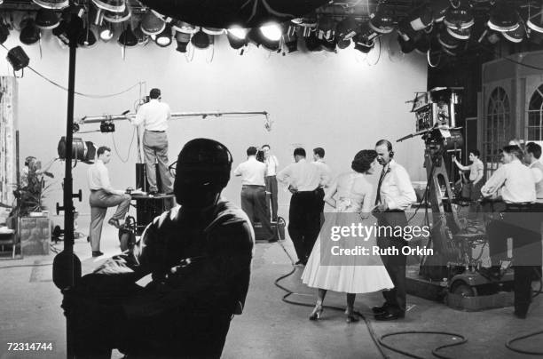 American stage, screen, and television actress Nanette Fabray, born Nanette Ruby Bernadette Fabares, speaks to an unidentified man while comedian Sid...