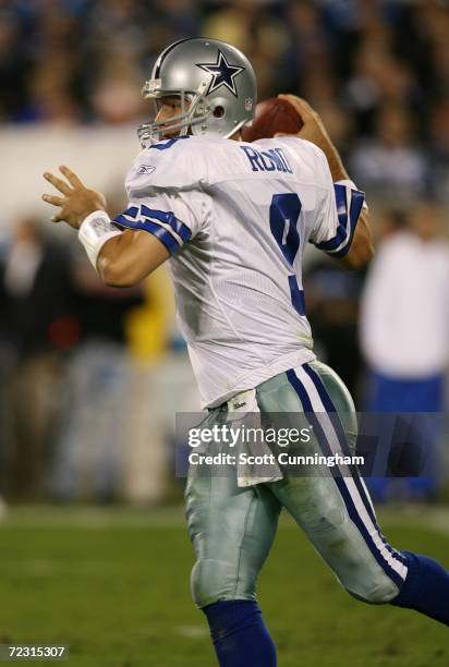 Quarterback Tony Romo of the Dallas Cowboys passes against the Carolina Panthers at Bank Of America Stadium on October 29, 2006 in Charlotte, North...