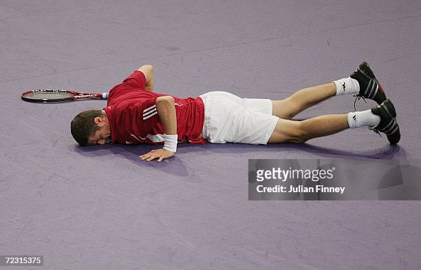 Marat Safin of Russia falls flat onto the floor in his match against Robin Soderling of Sweden during day two of the BNP Paribas ATP Tennis Masters...