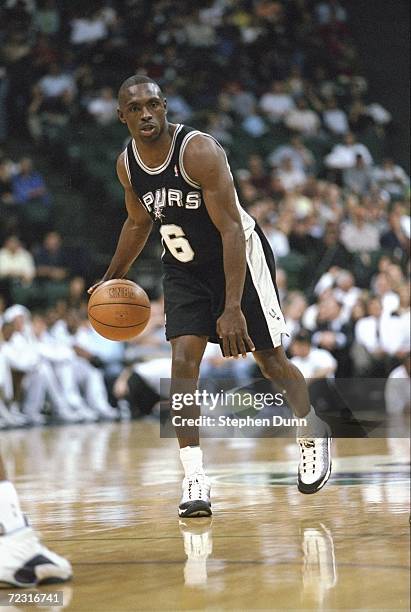 Avery Johnson of the San Antonio Spurs in action during the game against the Dallas Mavericks at the Reunion Arena in Dallas, Texas. The Spurs...