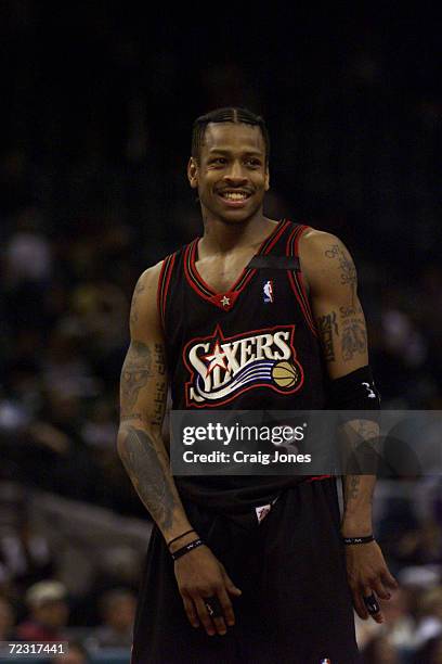 Allen Iverson of the Philadelphia 76ers has a laugh as his team defeats the Charlotte Hornets during game one of the Eastern Conference 1st round...