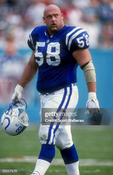 Center Jay Leeuwenburg of the Indianapolis Colts looks on during the game against the Miami Dolphins at the Pro Player Stadium in Miami, Florida. The...