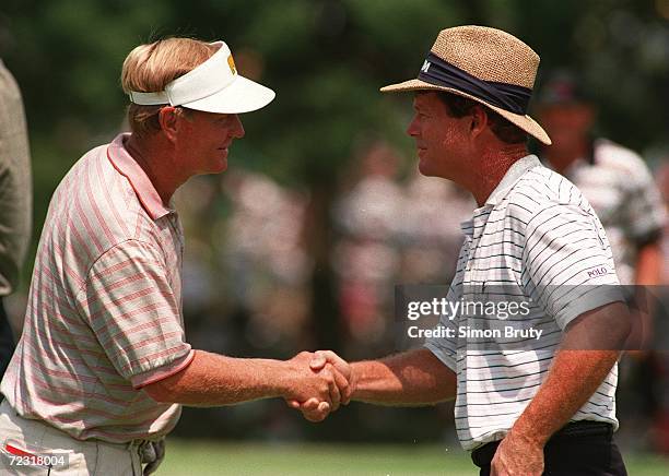 JACK NICKLAUS AND TOM WATSON SHAKE HANDS FOLLOWING WEDNESDAY'S PRACTICE ROUND FOR THE 76TH PGA CHAMPIONSHIP AT SOUTHERN HILLS CC IN TULSA OKLAHOMA....