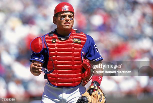 Catcher Ivan Rodriguez of the Texas Rangers looks on the field during the game against the Chicago White Sox at The Ballpark in Arlington, Texas. The...