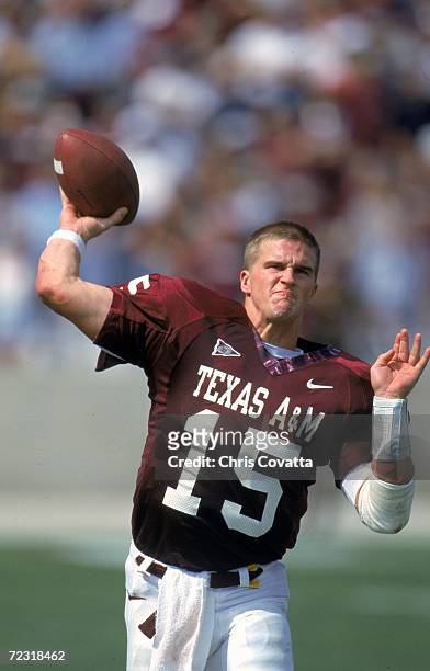 Randy McCown of the Texas A&M Aggies makes a practice throw before the game against the Baylor Bears at Kyle Field in College Station, Texas. The...