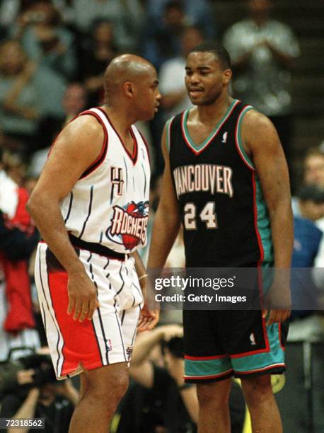 Forward Charles Barkley of the Houston Rockets and forward Othella Harringtonin of the Vancouver Grizzlies in action during the final game of the...