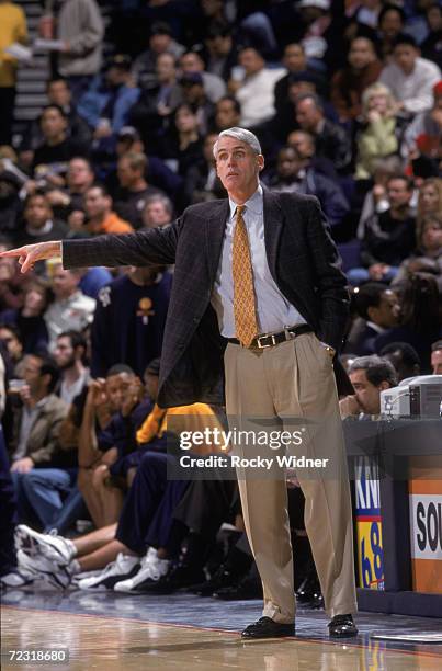 Head coach Brian Winters of the Dallas Mavericks points down court during the NBA game against the Golden State Warriors at the Arena in Oakland in...