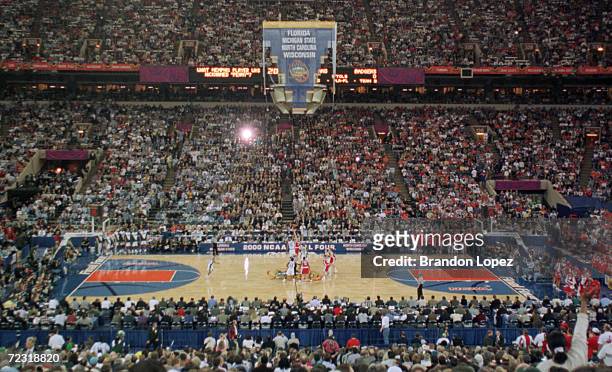 General view from above of the openning tip-off between Wisconsin and Michigan State during the semifinal round of the NCAA Final Four at the RCA...