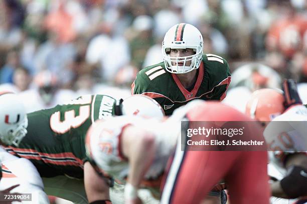Quarterback Ken Dorsey of the Miami Hurricanes surveys the defense during the Big East Conference football game against the Syracuse Orangemen at the...