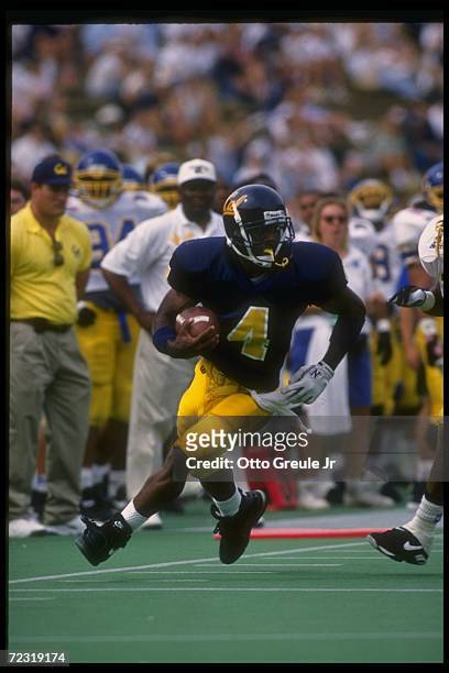 Wide receiver Na''il Benjamin of the California Golden Bears moves down the field during a game against the San Jose State Spartans at Spartan...