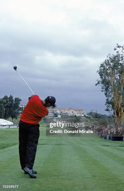 Tiger Woods makes a line drive to hole during the Nissan Open at the Riviera Country Club in Pacific Palisades, California. Mandatory Credit: Donald...