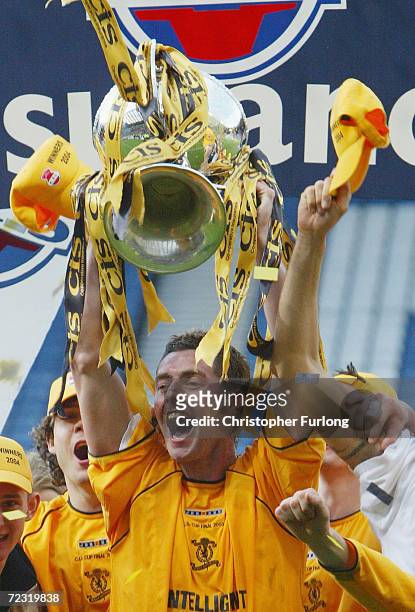 Livingston goal scorer Jamie McAllister celebrates winning the CIS Insurance Cup against Hibernian on March 14, 2004 at Hampden Park in Glasgow,...