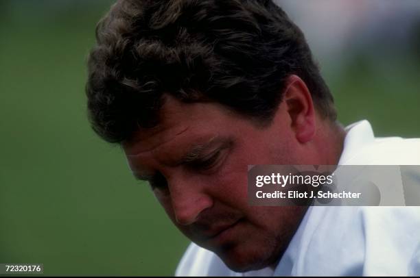 Quarterback Dan Marino of the Miami Dolphins looks on during the 1998 Miami Dolphins Training Camp at the Lockhart Stadium in Fort Lauderdale,...