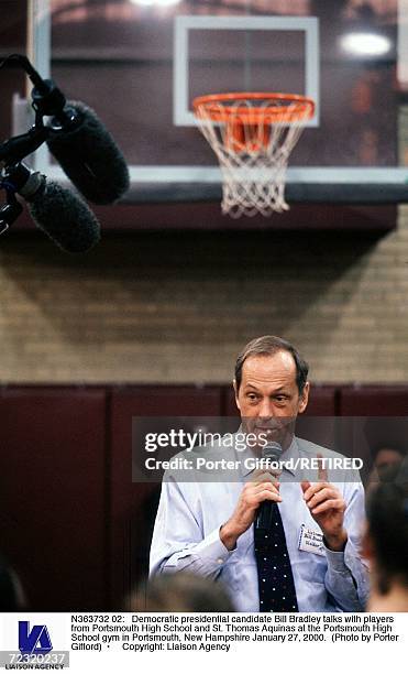 Democratic presidential candidate Bill Bradley talks with players from Portsmouth High School and St. Thomas Aquinas at the Portsmouth High School...