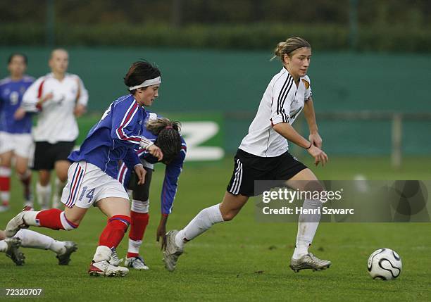 Bianca Schmidt of Germany in action against Caroline La Villa of France during the Women's U17 international friendly match between France and...