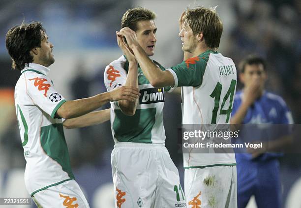 Aaron Hunt , Diego and Miroslav Klose of Bremen celebrates after Nikolaj Mihajlov of Sofia scored an own goal during the UEFA Champions League Group...