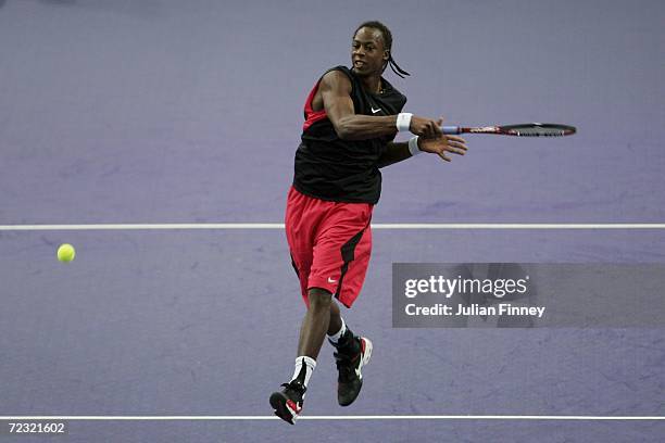 Gael Monfils of France plays a shot against Igor Andreev of Russia during day two of the BNP Paribas ATP Tennis Masters Series at the Palais...