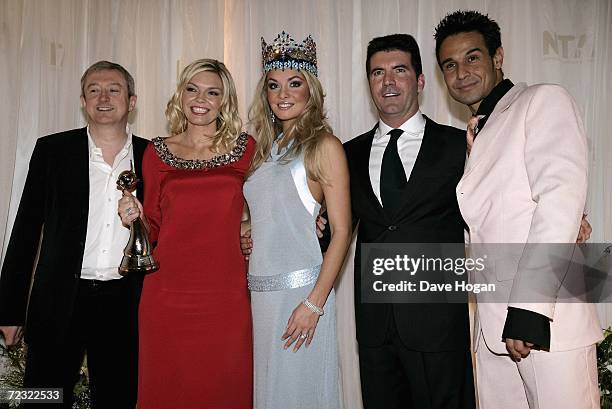 Music producer Louis Walsh, TV presenter Kate Thornton, Miss World 2006 Tatana Kucharova, music producer Simon Cowell and singer Chico Slimani pose...