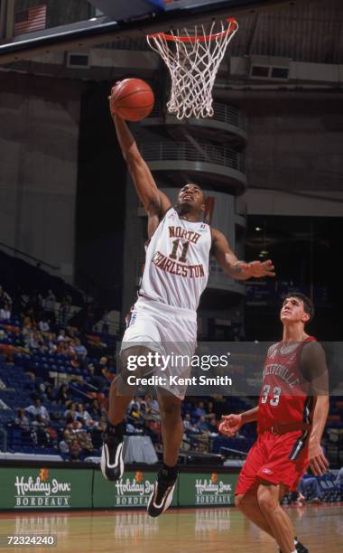 Guard Fred House of the North Charleston Lowgators shoots the ball during the NBDL game against the Fayetteville Patriots at the Crown Coliseum in...