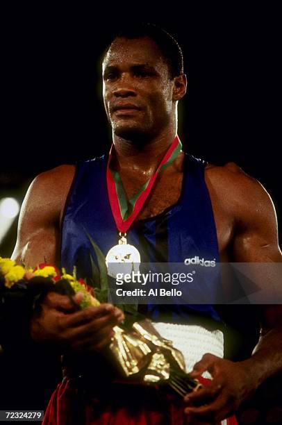 Portrait of Felix Savon with his medal taken after he won the fight against DeVarryl Williamson at the Goodwill Games in the theater at Madison...