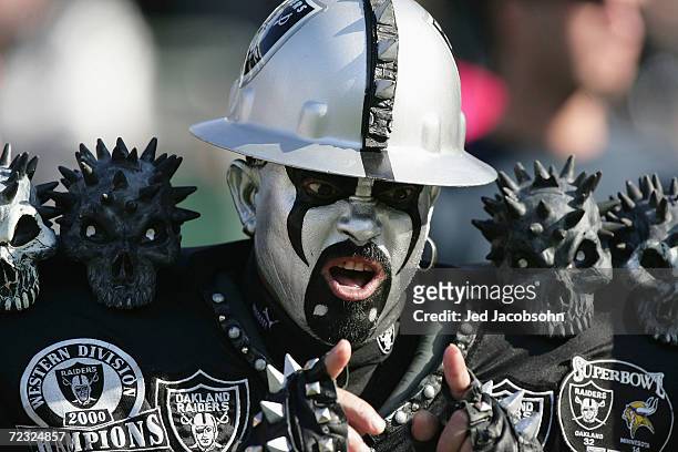 Fan of the Oakland Raiders cheers during the game against the Tennessee Titans at Network Associates Coliseum on December 19, 2004 in Oakland,...