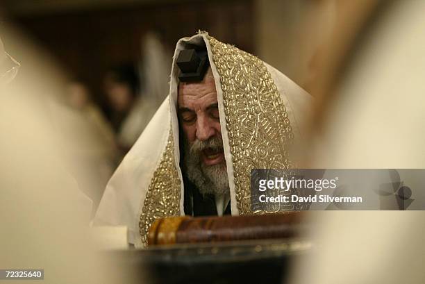Rabbi Yisrael Hager, spiritual leader of the Vizhnitz ultra-Orthodox Jewish community, reads from the Book of Esther during Purim festivities in his...