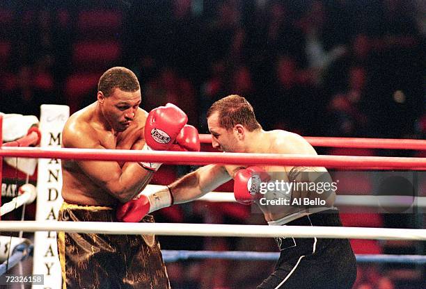 Fabrice Tiozzo throws a right punch to the gut during the fight against Ken Murphy at the Thomas and Mack Center in Las Vegas, Nevada. Mandatory...