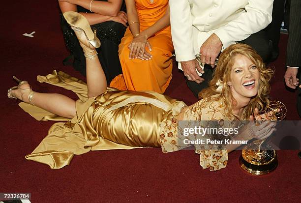 Actress Michelle Stafford poses with her award backstage at the 31st Annual Daytime Emmy Awards on May 21, 2004 at Radio City Music Hall, in New York...