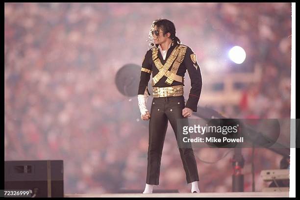 Singer Michael Jackson performs during halftime at Super Bowl XXVII between the Dallas Cowboys and the Buffalo Bills at the Rose Bowl in Pasadena,...