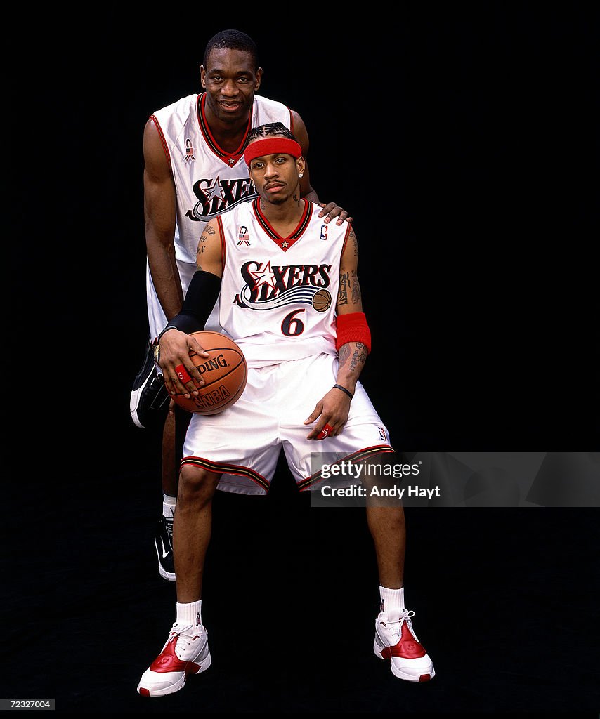 Mutombo and Iverson pose for a portrait