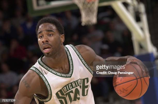 Mateen Cleaves of Michigan State University moves the ball upcourt against Valparaiso University during the first round of the NCAA Tournament...