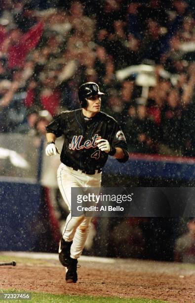 Robin Ventura of the New York Mets runs the bases after making a home run during the National League Championship Series game four against the...