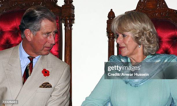 Prince Charles, Prince of Wales and Camilla, Duchess of Cornwall, catch each others eye at the Fatima Jinnah University on the third day of a week...